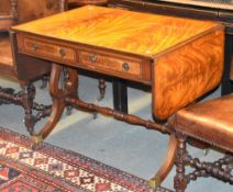 A mahogany sofa table in Regency style, 20th century Provenance: The collection of the late Ronnie