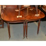 A Victorian mahogany dining table on turned legs, with one additional leaf insertion, 175cm long