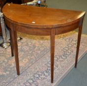 A George III half round card table, 90cm wide, 44cm deep a George III mahogany butler's tray and