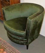 A green velvet upholstered tub armchair, of recent manufacture, by the Sofa & Chair Company, London,