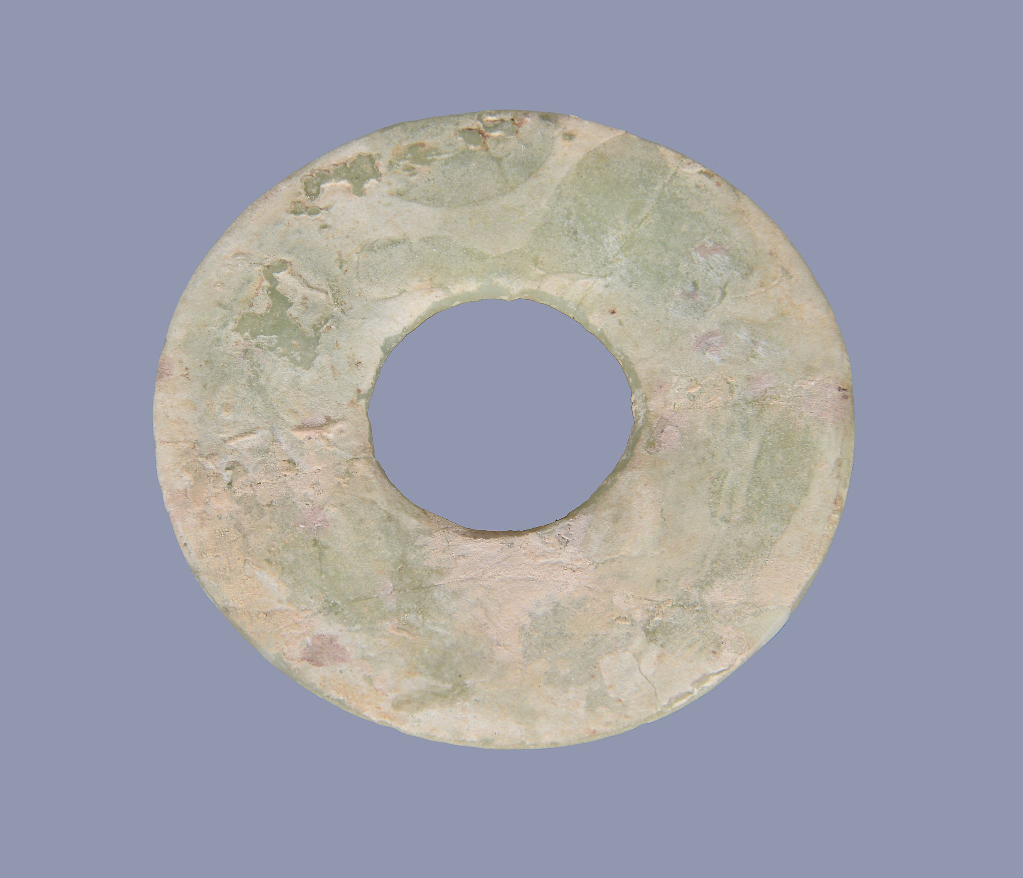 A Chinese glass disc , bi , of celadon colour imitating jade, possibly Warring States-Han Dynasty, - Image 2 of 4