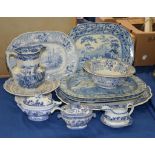 An assortment of Staffordshire blue and white printed pottery, var ious dates, mostly 19th