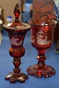 A Bohemian ruby-flashed goblet and cover, circa 1860, engraved with a panel of Mazeppa tied to his