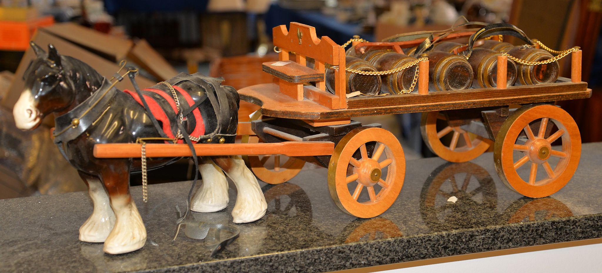 Two similar Horse and Drays advertising breweries, in the manner of Beswick examples