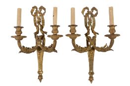 A set of five late 19th century French gilt bronze two branch wall lights, by Henry Dasson , Paris,