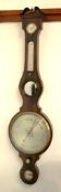 A mahogany wheel barometer, with mercury thermometer the silvered dial showing the usual