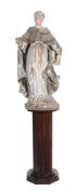 A Continental sculpted wood and polychrome decorated model of a saint, early 18th century,