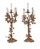 A pair of French gilt metal five light candelabra, late 19th / early 20th century, each with one