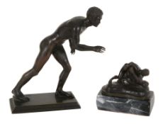 An Italian patinated bronze model of an athlete, late 19th century, cast after the Antique, atop a