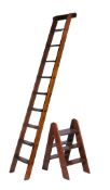 A mahogany library ladder, late 19th/early 20th century , surmounted by a bar rest, appox. 240cm