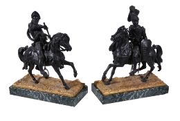 A pair of patinated bronze groups of knights on horseback, late 19th century, portrayed in plate