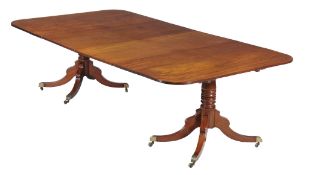 A mahogany twin-pedestal dining table , circa 1815 and later, possibly Scottish, with two