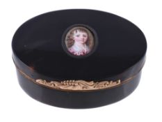 Ω A mid-18th century plain tortoiseshell oval table snuff box, the cover inset with an oval enamel