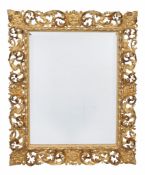A continental carved rectangular giltwood wall mirror , probably Italian, 107cm high, 88cm wide