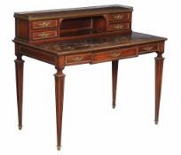 A French mahogany and gilt metal mounted desk , late 19th century, the superstructure with pierced