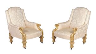 A pair of Victorian carved giltwood and gesso armchairs, circa 1860, in the manner of Holland &