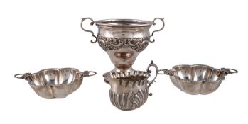 Four items of small silver, comprising: a twin handled ogee pedestal sugar basin by Rosenzweig,