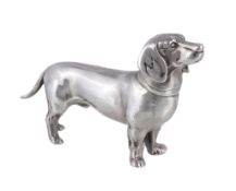 A silver model of a dachshund, makers mark JS & MJ (not traced), London 1985, modelled standing