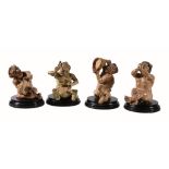 A set of four Martin Brothers stoneware grotesque figures of imp musicians A set of four Martin