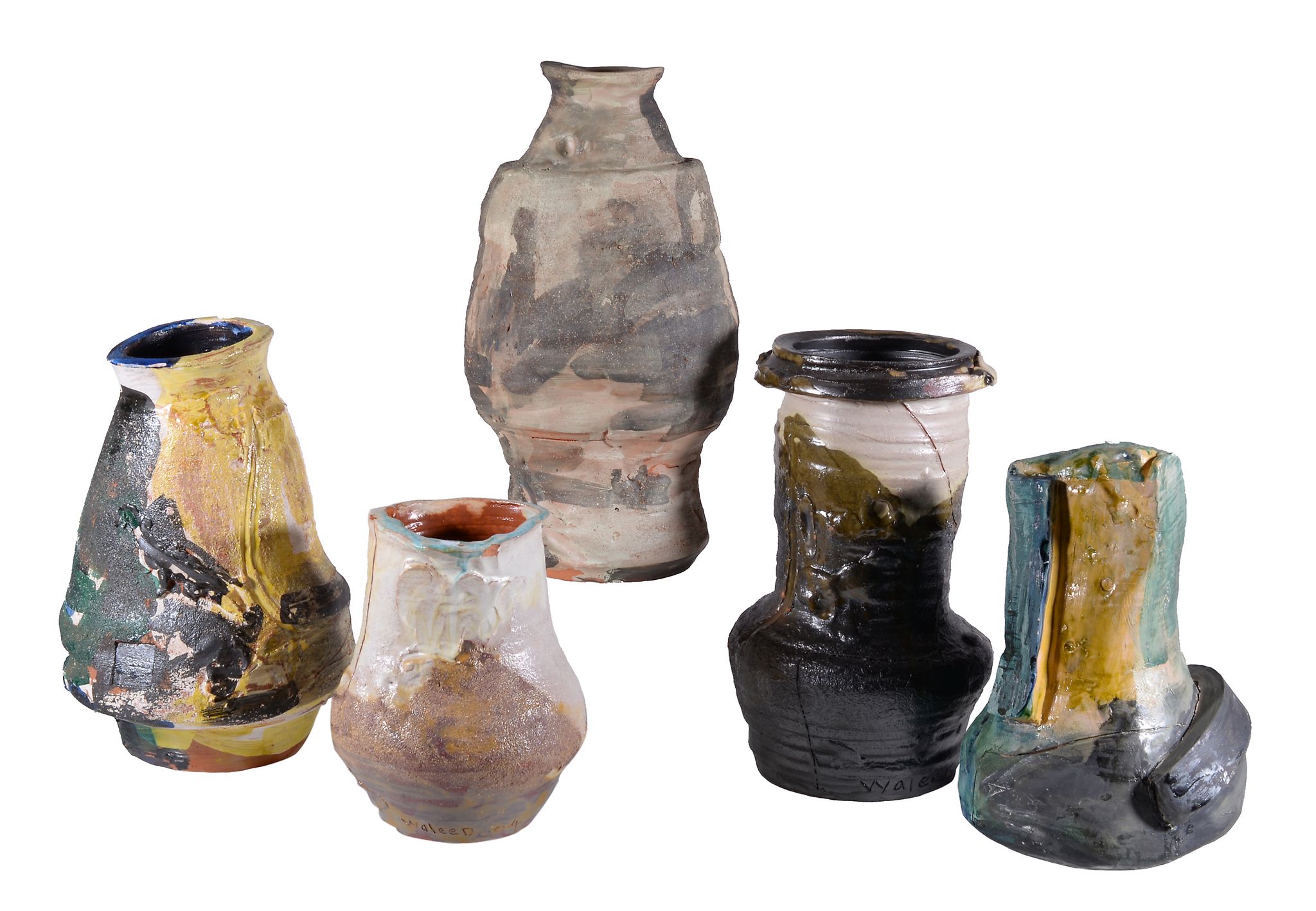 Waleed R. Qaisi (Iraqi, b. 1963), a sculpture and four earthenware vases, glazed in various
