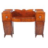 Ω A Scottish Regency mahogany and rosewood inlaid pedestal sideboard , circa 1820, 125cm high, 184cm