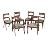 A set of six late Regency mahogany dining chairs, circa 1820, to include a pair of armchairs, each