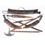 An assortment of edged weapons, 19th century and later, including: two various boar hunting spears,