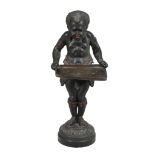 A Victorian spelter dumbwaiter in the form of a blackamoor child, second half 19th century, modeled