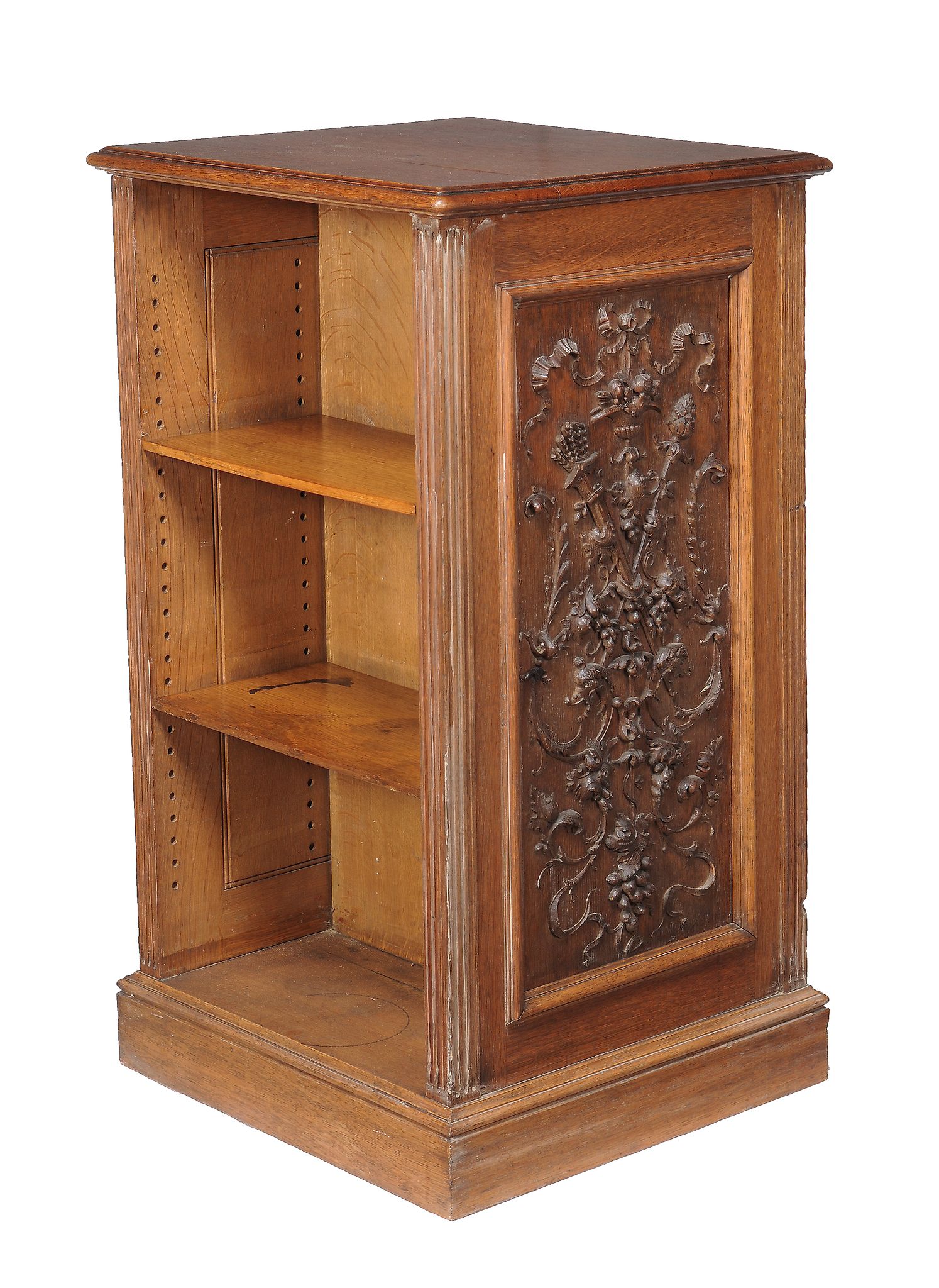 A late Victorian oak free standing bookcase , circa 1890, one panel side with applied moulding with