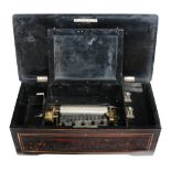 A simulated rosewood music box , late 19th century, almost certainly Swiss, the mechanism playing a