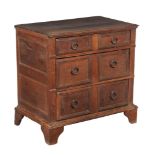 An oak chest of drawers , circa 1700, of small proportion, with three long drawers each with