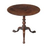 A George III mahogany tripod table , late 18th century, the top with moulded edge above a turned