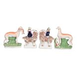 Two pairs of Staffordshire pottery groups , mid 19th century, comprising a pair of children riding