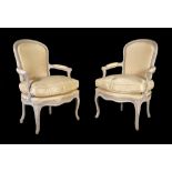 A pair of Louis XV/XVI transitional grey painted fauteuils , circa 1760, indistinctly stamped but