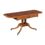 Ω A George IV rosewood and satinwood crossbanded sofa table, circa 1825 in the manner of Gillows,