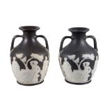 Two Wedgwood black basalt copies of the Portland or Barberini vase , late 19th century, typically