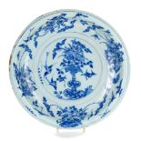 A blue and white tin-glazed charger, early 18th century, Greman or Dutch, the centre painted with a