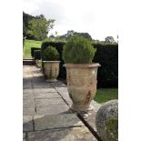 A pair of French terracotta garden urns, 19th century, in the Neoclassical taste, each moulded