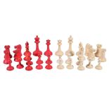 Ω A Victorian carved and part red stained ivory Staunton pattern chess set, Jaques of London,