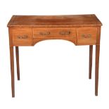 A George III mahogany dressing table, circa 1790, inlaid with boxwood stringing, the rectangular