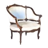 A Victorian carved walnut tub armchair, in Louis XV style, circa 1890, carved with acanthus detail