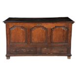 A George III oak and holly crossbanded mule chest , with a hinged moulded oblong top above three