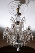A Continental glass ten branch chandelier in Louis XV taste , 20th century, with pendant drops,