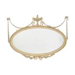 A giltwood and composition oval wall mirror , after the manner of Robert Adam, with central urn
