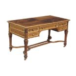 A French walnut and parcel gilt writing table , 20th century, in early 19th century taste, 75cm