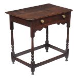 An oak side table, early 18th century, with re-entrant corners to the rectangular top, 69cm high,