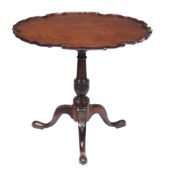 A mahogany tripod table in George III style , 19th century, 69cm high, 79cm diameter