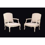 A pair of painted wood armchairs in Louis XV style , of recent manufacture, with check upholstered