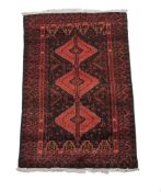 A Belouch rug, approximately 172 x 93