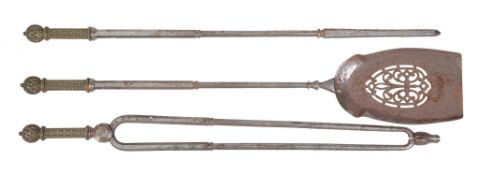 A set of three steel and brass mounted fire tools, second quarter 19th century, comprising shovel,